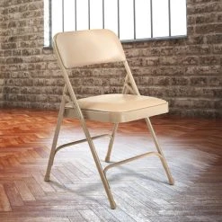 National Public Seating 1201 Beige Metal Folding Chair With 1 1/4" French Beige Vinyl Padded Seat