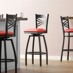 Lancaster Table & Seating Black Finish Cross Back Swivel Bar Stool With 2 1/2" Red Vinyl Padded Seat