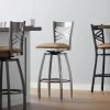 Lancaster Table & Seating Clear Coat Finish Cross Back Swivel Bar Stool With 2 1/2" Light Brown Vinyl Padded Seat