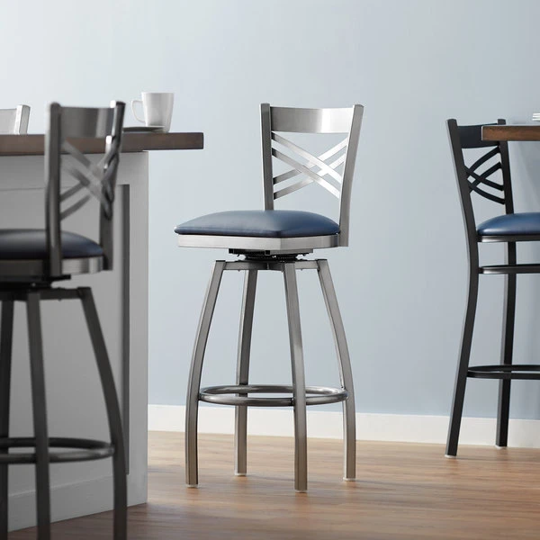 Lancaster Table & Seating Clear Coat Finish Cross Back Swivel Bar Stool With 2 1/2" Navy Vinyl Padded Seat 1 Lancaster Table & Seating Clear Coat Finish Cross Back Swivel Bar Stool With 2 1/2" Navy Vinyl Padded Seat