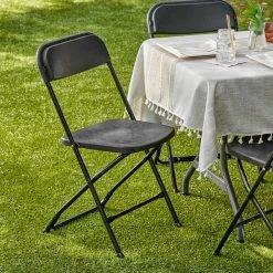 Lancaster Table & Seating Black Textured And Contoured Folding Chair