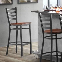 Lancaster Table & Seating Black Finish Ladder Back Bar Stool With Antique Walnut Wood Seat