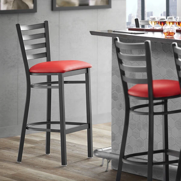 Lancaster Table & Seating Black Finish Ladder Back Bar Stool With 2 1/2" Red Vinyl Padded Seat 1 Lancaster Table & Seating Black Finish Ladder Back Bar Stool With 2 1/2" Red Vinyl Padded Seat