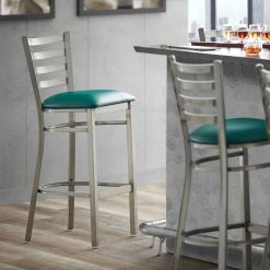 Lancaster Table & Seating Clear Coat Finish Ladder Back Bar Stool With 2 1/2" Green Vinyl Padded Seat