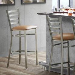 Lancaster Table & Seating Clear Coat Finish Ladder Back Bar Stool With 2 1/2" Light Brown Vinyl Padded Seat