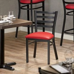 Lancaster Table & Seating Black Finish Ladder Back Chair With 2 1/2" Red Vinyl Padded Seat
