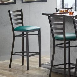 Lancaster Table & Seating Distressed Copper Finish Ladder Back Bar Stool With 2 1/2" Green Vinyl Padded Seat