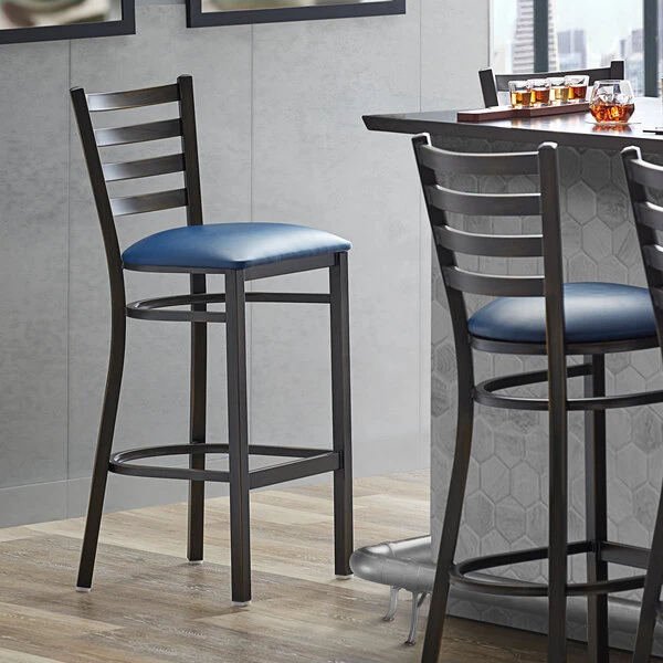 Lancaster Table & Seating Distressed Copper Finish Ladder Back Bar Stool With 2 1/2" Navy Blue Vinyl Padded Seat 1 Lancaster Table & Seating Distressed Copper Finish Ladder Back Bar Stool With 2 1/2" Navy Blue Vinyl Padded Seat