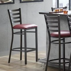 Lancaster Table & Seating Distressed Copper Finish Ladder Back Bar Stool With 2 1/2" Burgundy Vinyl Padded Seat
