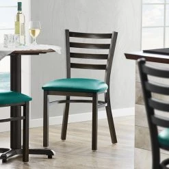 Lancaster Table & Seating Distressed Copper Finish Ladder Back Chair With 2 1/2" Green Vinyl Padded Seat