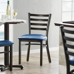 Lancaster Table & Seating Distressed Copper Finish Ladder Back Chair With 2 1/2" Navy Vinyl Padded Seat