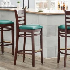 Lancaster Table & Seating Mahogany Ladder Back Bar Height Chair With Green Padded Seat