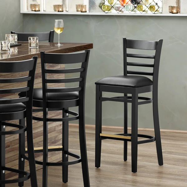 Lancaster Table & Seating Black Ladder Back Bar Height Chair With Black Padded Seat 1 Lancaster Table & Seating Black Ladder Back Bar Height Chair With Black Padded Seat