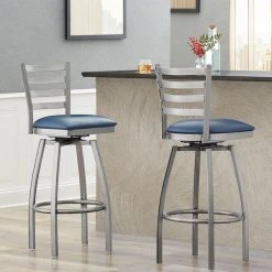 Lancaster Table & Seating Clear Coat Finish Ladder Back Swivel Bar Stool With 2 1/2" Navy Vinyl Padded Seat