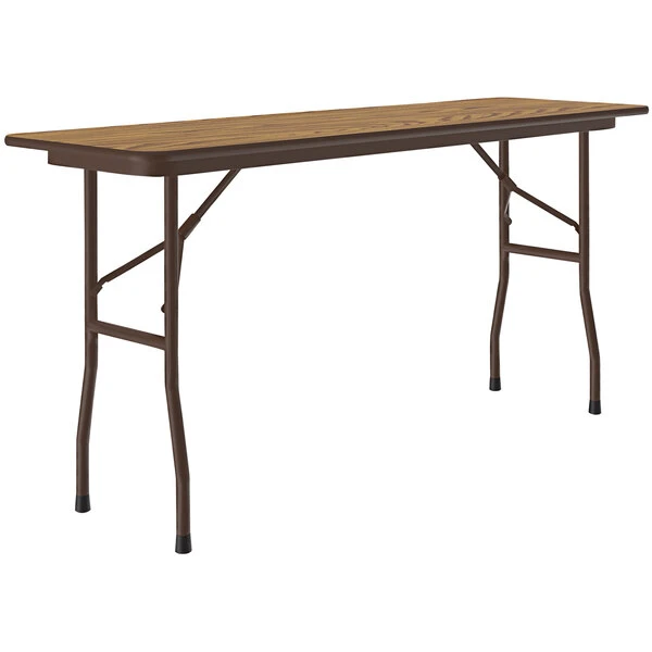 Correll 18" X 96" Medium Oak Thermal-Fused Laminate Top Folding Table With Brown Frame 1 Correll 18" X 96" Medium Oak Thermal-Fused Laminate Top Folding Table With Brown Frame