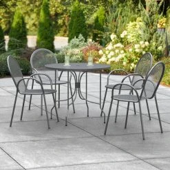 Lancaster Table & Seating Harbor Black 36" Round Outdoor Standard Height Table With Ornate Legs And 4 Arm Chairs