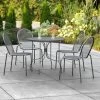 Lancaster Table & Seating Harbor Black 36" Round Outdoor Standard Height Table With Ornate Legs And 4 Side Chairs
