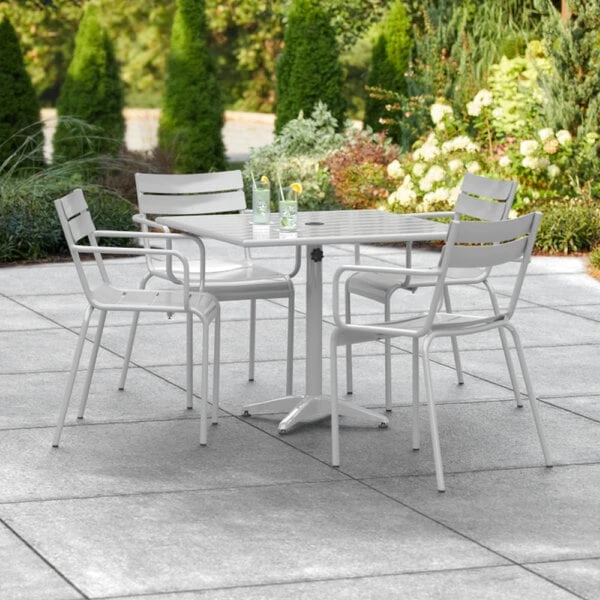 Lancaster Table & Seating 36" X 36" Silver Powder-Coated Aluminum Dining Height Outdoor Table With Umbrella Hole And 4 Arm Chairs 1 Lancaster Table & Seating 36" X 36" Silver Powder-Coated Aluminum Dining Height Outdoor Table With Umbrella Hole And 4 Arm Chairs