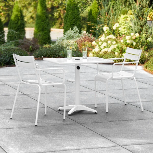 Lancaster Table & Seating 24" X 32" White Powder-Coated Aluminum Dining Height Outdoor Table With Umbrella Hole And 2 Arm Chairs 1 Lancaster Table & Seating 24" X 32" White Powder-Coated Aluminum Dining Height Outdoor Table With Umbrella Hole And 2 Arm Chairs