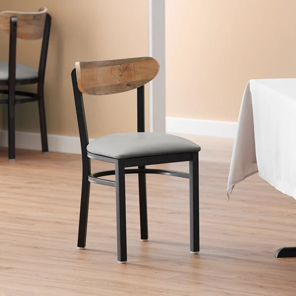 LT&S Boomerang Series Lancaster Table & Seating Boomerang Black Finish Chair With 2 1/2" Light Gray Vinyl Padded Seat And Driftwood Back 1 LT&S Boomerang Series Lancaster Table & Seating Boomerang Black Finish Chair With 2 1/2" Light Gray Vinyl Padded Seat And Driftwood Back