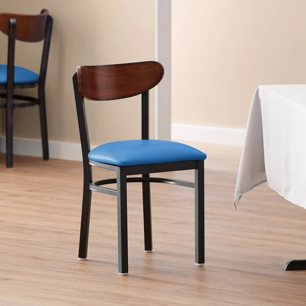 LT&S Boomerang Series Lancaster Table & Seating Boomerang Black Finish Chair With 2 1/2" Blue Vinyl Padded Seat And Antique Walnut Wood Back 1 LT&S Boomerang Series Lancaster Table & Seating Boomerang Black Finish Chair With 2 1/2" Blue Vinyl Padded Seat And Antique Walnut Wood Back