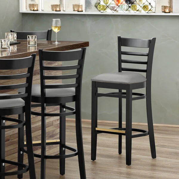Lancaster Table & Seating Black Finish Wooden Ladder Back Bar Height Chair With Light Gray Padded Seat 1 Lancaster Table & Seating Black Finish Wooden Ladder Back Bar Height Chair With Light Gray Padded Seat
