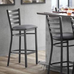 Lancaster Table & Seating Black Finish Ladder Back Bar Stool With 2 1/2" Dark Gray Vinyl Padded Seat