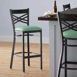 Lancaster Table & Seating Black Finish Cross Back Bar Stool With 2 1/2" Seafoam Vinyl Padded Seat