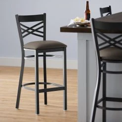 Lancaster Table & Seating Black Finish Cross Back Bar Stool With 2 1/2" Taupe Vinyl Padded Seat