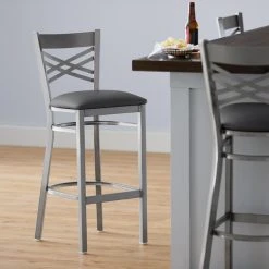 Lancaster Table & Seating Clear Coat Finish Cross Back Bar Stool With 2 1/2" Dark Gray Vinyl Padded Seat