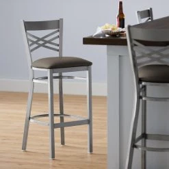 Lancaster Table & Seating Clear Coat Finish Cross Back Bar Stool With 2 1/2" Taupe Vinyl Padded Seat