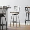 Lancaster Table & Seating Clear Coat Finish Cross Back Swivel Bar Stool With 2 1/2" Taupe Vinyl Padded Seat