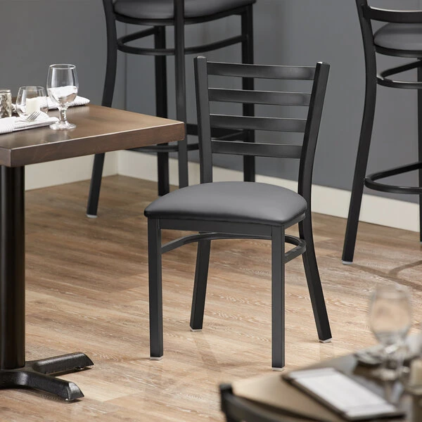Lancaster Table & Seating Black Finish Ladder Back Chair With 2 1/2" Dark Gray Vinyl Padded Seat 1 Lancaster Table & Seating Black Finish Ladder Back Chair With 2 1/2" Dark Gray Vinyl Padded Seat