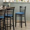 Lancaster Table & Seating Black Finish Wooden Ladder Back Bar Height Chair With Blue Padded Seat