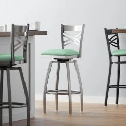 Lancaster Table & Seating Clear Coat Finish Cross Back Swivel Bar Stool With 2 1/2" Seafoam Vinyl Padded Seat