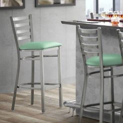 Lancaster Table & Seating Clear Coat Finish Ladder Back Bar Stool With 2 1/2" Seafoam Vinyl Padded Seat
