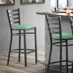 Lancaster Table & Seating Black Finish Ladder Back Bar Stool With 2 1/2" Seafoam Vinyl Padded Seat