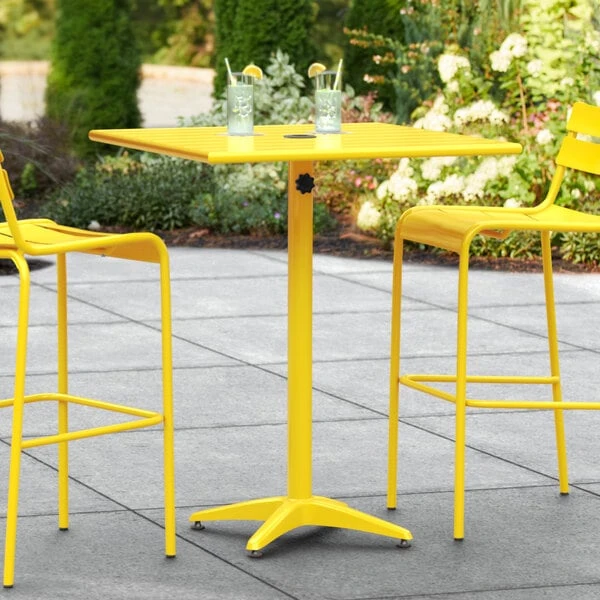 Lancaster Table & Seating 32" X 32" Yellow Powder-Coated Aluminum Bar Height Outdoor Table With Umbrella Hole 1 Lancaster Table & Seating 32" X 32" Yellow Powder-Coated Aluminum Bar Height Outdoor Table With Umbrella Hole
