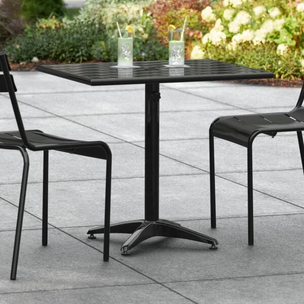 Lancaster Table & Seating 24" X 32" Black Powder-Coated Aluminum Dining Height Outdoor Table With Umbrella Hole 1 Lancaster Table & Seating 24" X 32" Black Powder-Coated Aluminum Dining Height Outdoor Table With Umbrella Hole