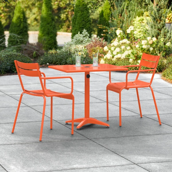 Lancaster Table & Seating 24" X 32" Orange Powder-Coated Aluminum Standard Height Outdoor Table With Umbrella Hole And 2 Arm Chairs 1 Lancaster Table & Seating 24" X 32" Orange Powder-Coated Aluminum Standard Height Outdoor Table With Umbrella Hole And 2 Arm Chairs