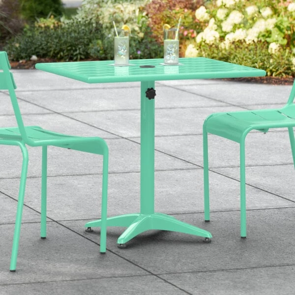 Lancaster Table & Seating 24" X 32" Seafoam Powder-Coated Aluminum Dining Height Outdoor Table With Umbrella Hole 1 Lancaster Table & Seating 24" X 32" Seafoam Powder-Coated Aluminum Dining Height Outdoor Table With Umbrella Hole