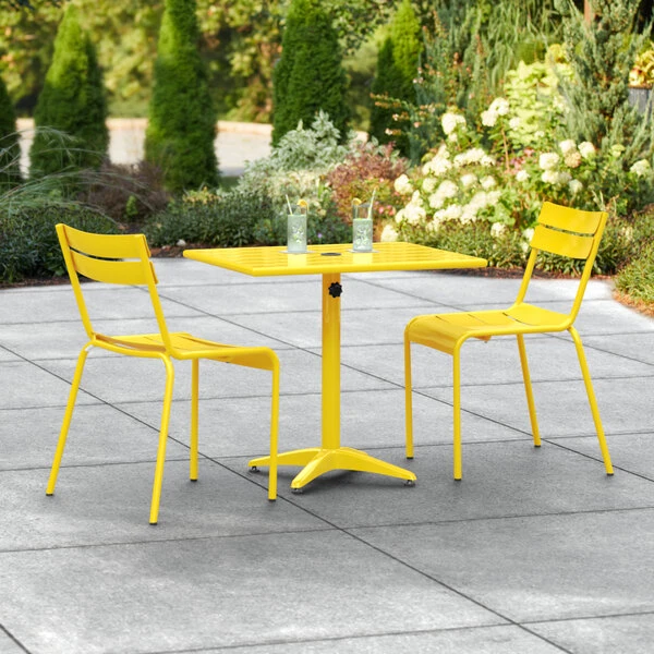 Lancaster Table & Seating 24" X 32" Yellow Powder-Coated Aluminum Standard Height Outdoor Table With Umbrella Hole And 2 Side Chairs 1 Lancaster Table & Seating 24" X 32" Yellow Powder-Coated Aluminum Standard Height Outdoor Table With Umbrella Hole And 2 Side Chairs