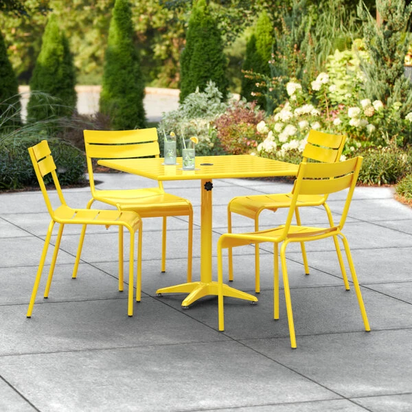 Lancaster Table & Seating 36" X 36" Yellow Powder-Coated Aluminum Standard Height Outdoor Table With Umbrella Hole And 4 Side Chairs 1 Lancaster Table & Seating 36" X 36" Yellow Powder-Coated Aluminum Standard Height Outdoor Table With Umbrella Hole And 4 Side Chairs