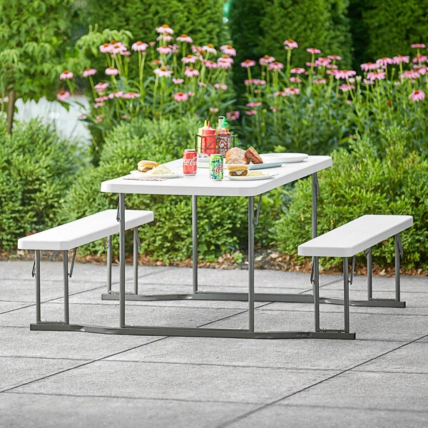 Lancaster Table & Seating 30" X 71" Rectangular White Plastic Folding Picnic Table With Attached Benches 1 Lancaster Table & Seating 30" X 71" Rectangular White Plastic Folding Picnic Table With Attached Benches
