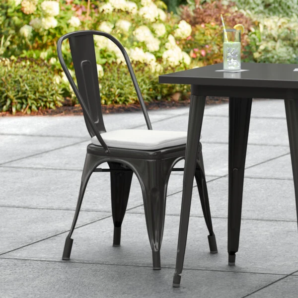 LT&S Alloy Series Lancaster Table & Seating Alloy Series Black Stackable Metal Indoor / Outdoor Industrial Cafe Chair With Vertical Slat Back And Gray Fabric Magnetic Cushion 1 LT&S Alloy Series Lancaster Table & Seating Alloy Series Black Stackable Metal Indoor / Outdoor Industrial Cafe Chair With Vertical Slat Back And Gray Fabric Magnetic Cushion