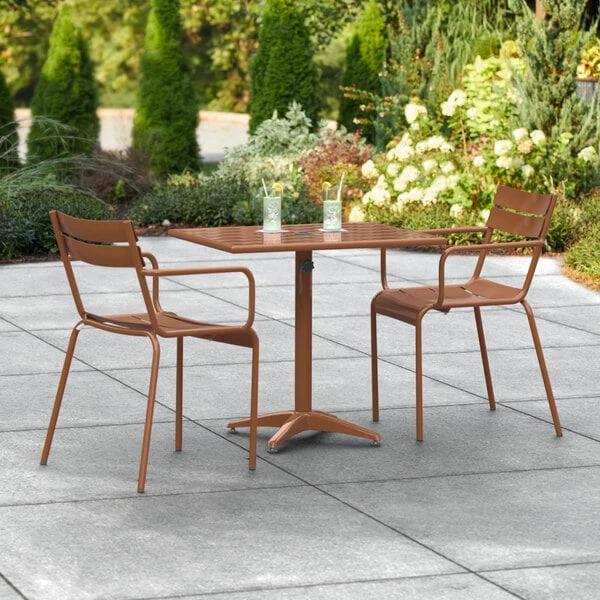 Lancaster Table & Seating 24" X 32" Brown Powder-Coated Aluminum Dining Height Outdoor Table With Umbrella Hole And 2 Arm Chairs 1 Lancaster Table & Seating 24" X 32" Brown Powder-Coated Aluminum Dining Height Outdoor Table With Umbrella Hole And 2 Arm Chairs