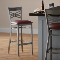 Lancaster Table & Seating Clear Coat Finish Cross Back Bar Stool With 2 1/2" Burgundy Vinyl Padded Seat