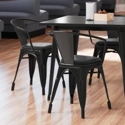 LT&S Alloy Series Lancaster Table & Seating Alloy Series Black Metal Indoor Arm Chair With Black Vinyl Cushion