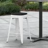 LT&S Alloy Series Lancaster Table & Seating Alloy Series White Stackable Metal Indoor / Outdoor Industrial Cafe Counter Height Stool With Black Fabric Magnetic Cushion