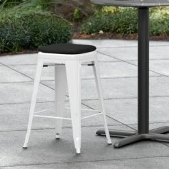 LT&S Alloy Series Lancaster Table & Seating Alloy Series White Stackable Metal Indoor / Outdoor Industrial Cafe Counter Height Stool With Black Fabric Magnetic Cushion